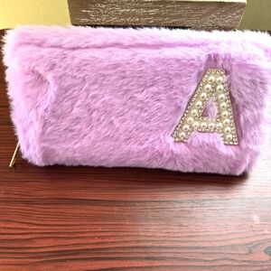 Claire's Furry wallet